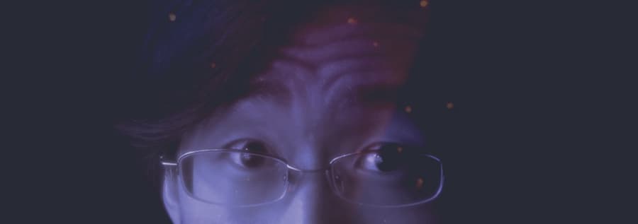Blurry Blue Light on Face with Light Leaks